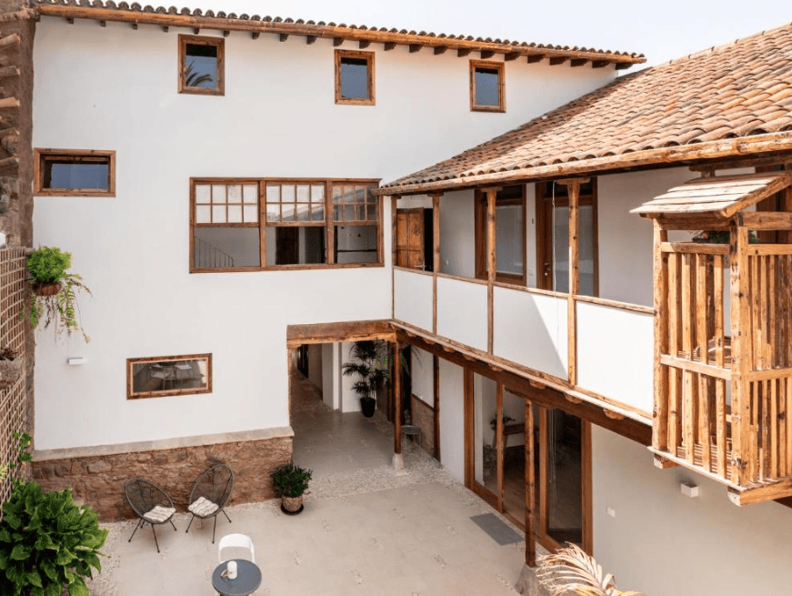 Best hotels La Laguna, Tenerife. Inner courtyard, white building with wooden balcony.