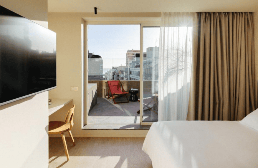 Clean hotel room and balcony overlooking the city. Hotel Taro is a recommended on the where to stay in Santa Cruz de Tenerife list.