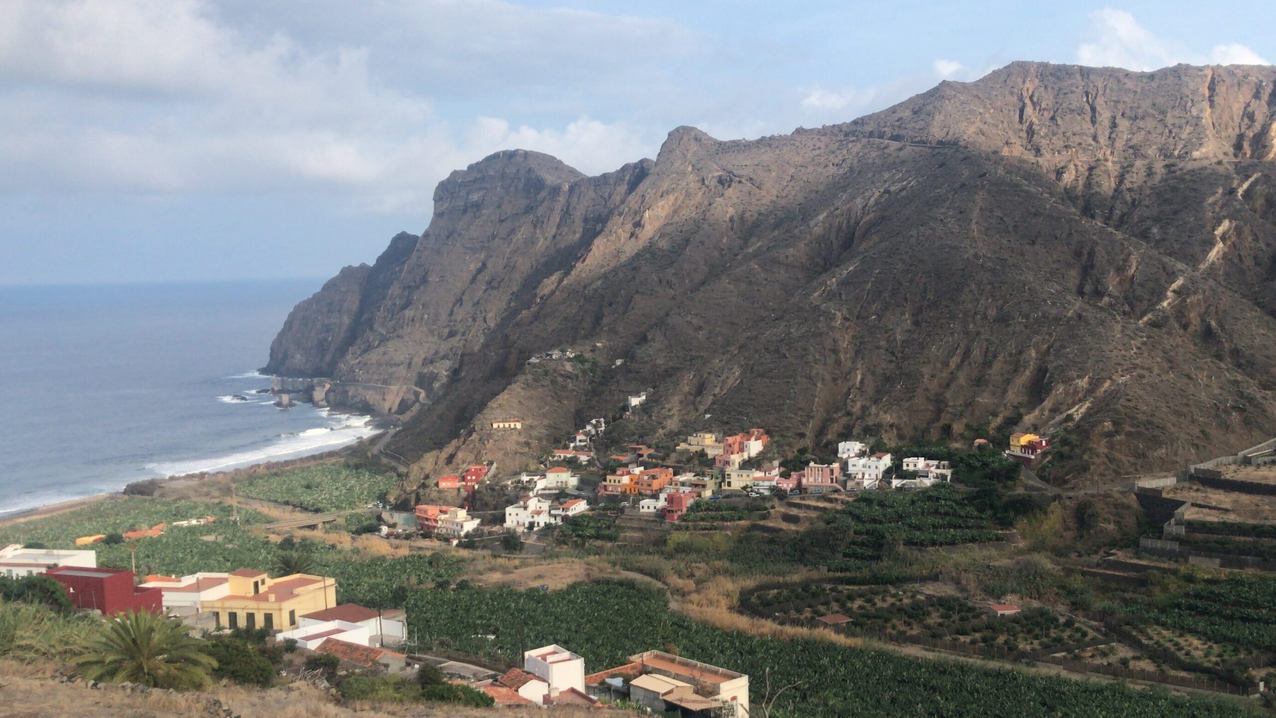 Fertile, green valley with a small collection of houses in Hermigua, La Gomera