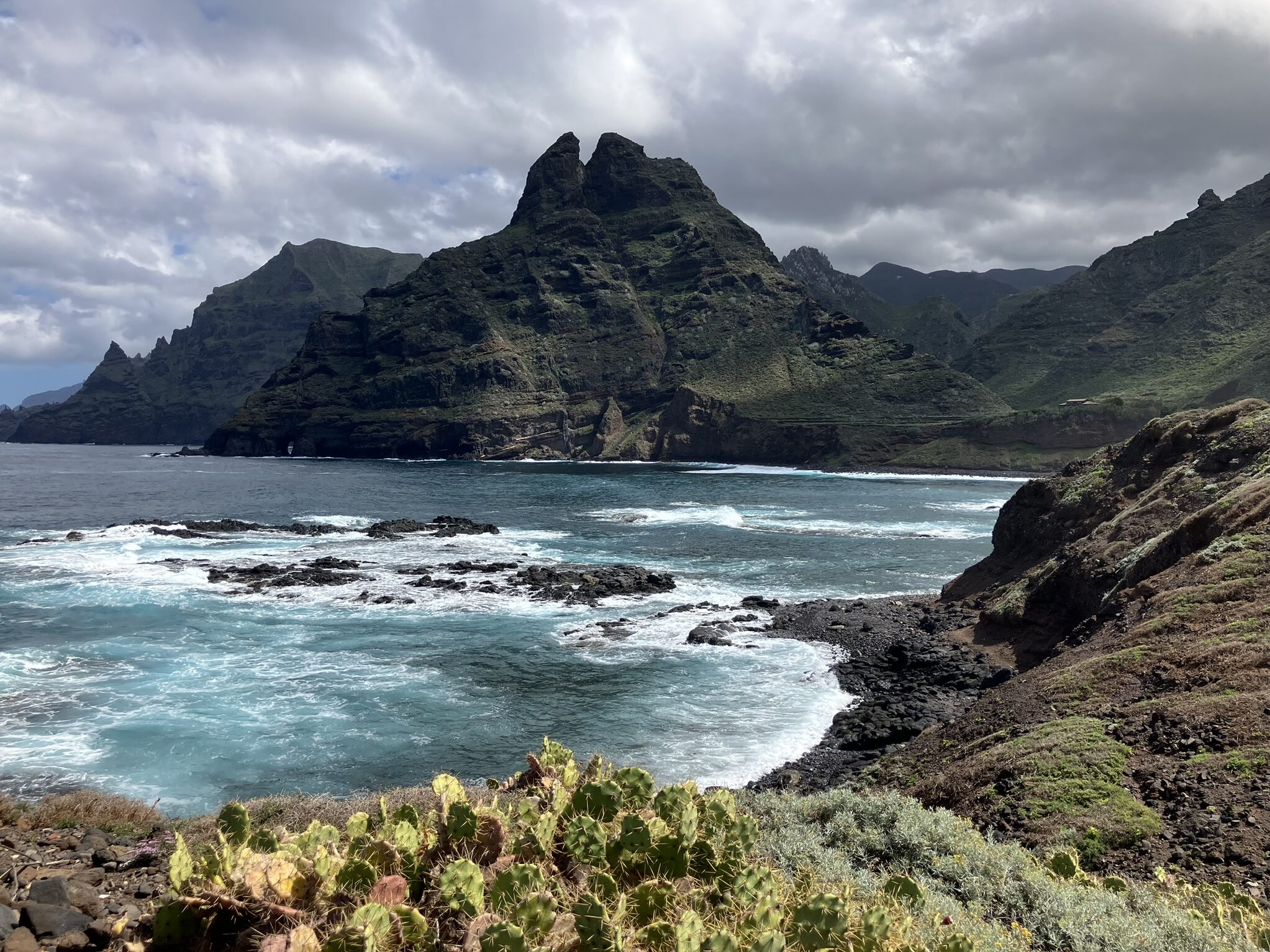 Volcanic mountains and meet the Atlantic Ocean in Punta de Hidalgo, Tenerife