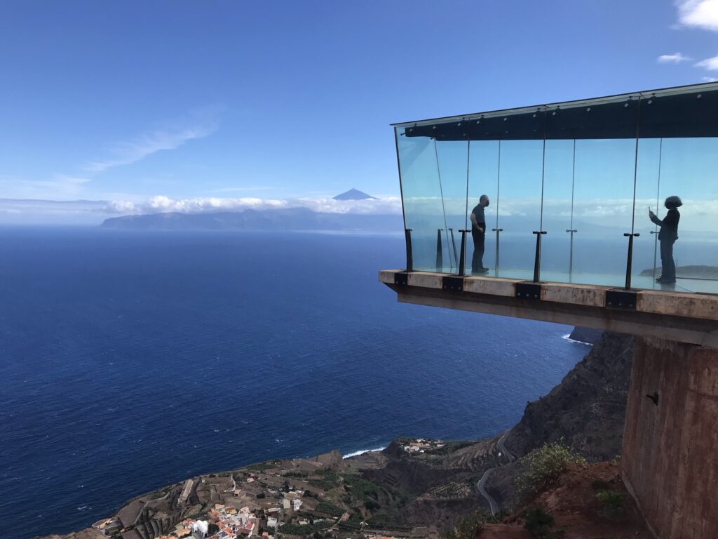 Glass viewpoint Mirador de Abrante jutting over large cliff. Recommended as part of the beginner's guide to La Gomera