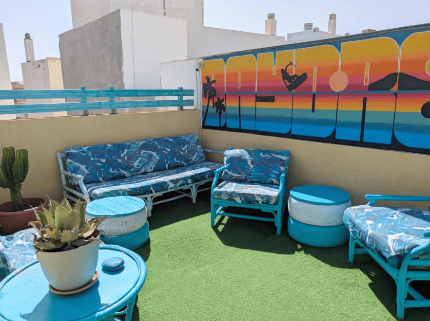 Cozy, colorful and sunny rootfop terrace of Daydream El Medano Coliving. Part of El Médano hostel guide
