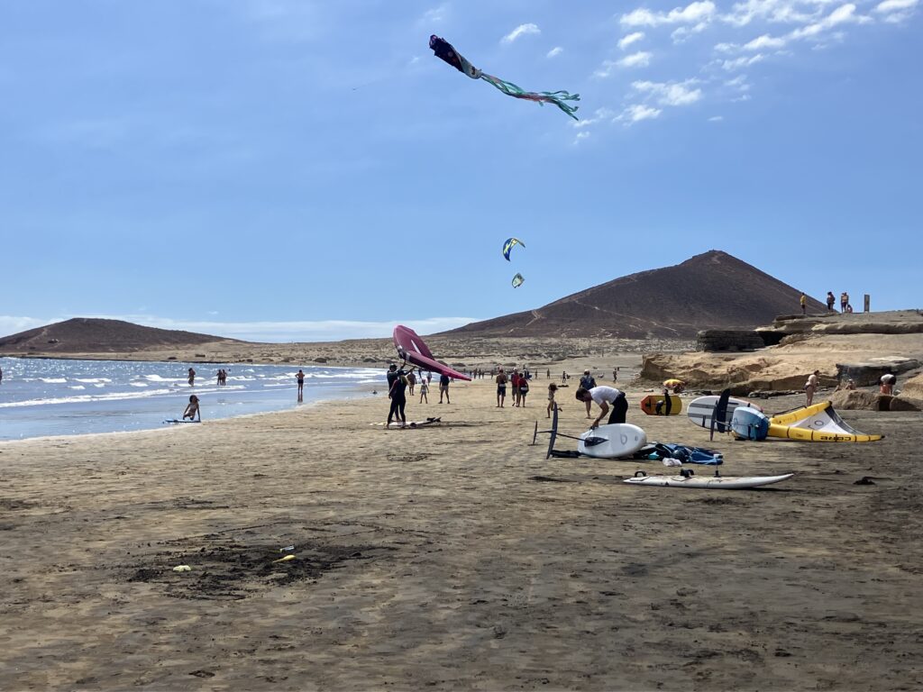 kite flying, a variety of windsurf and kitesurf equiptment on the beach